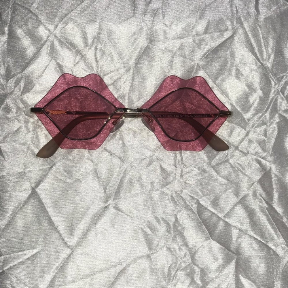 Pink kissy lip sunglasses.